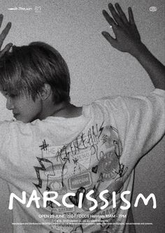 a young boy with his hands up in the air while wearing a t - shirt that says narcissm