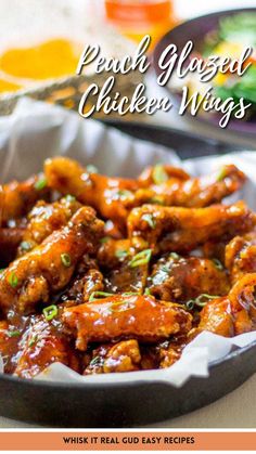 chicken wings with sauce in a pan on a table