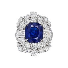 A gorgeous and important cocktail ring, featuring a cushion cut sapphire weighing 6.08 carats. Accented with mixed-cut diamonds weighing 5.02 carats total. A stunning ring, set beautifully on 18K white gold. Size 5.5 US, resizable upon request. Perfect for a luxurious event. Available in matching necklace, earrings, and bracelet. Please inquire about items DN1465, DEAR1714, and TB778. Roman Malakov is a custom house, specializing in creating anything you can imagine. If you would like to receive Diamond Eternity Wedding Band, Sapphire Diamond Engagement, Imagine If, Custom House, Diamond Cocktail Rings, Eternity Wedding Band, Diamond Eternity, Matching Necklaces, Diamond Cluster