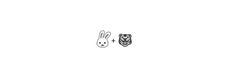 two stickers that are on the side of a white wall, one with a cat and another with a bunny face