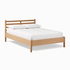 a wooden bed frame with white sheets and pillows on it, against a white background