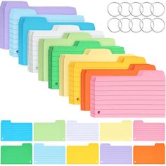 colorful file folders lined up in rows with rings on each side and various colors