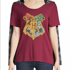 a women's harry potter t - shirt with hog potter crest on the front