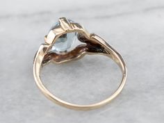 This stunning aquamarine has been set into this Retro era solitaire ring. The cool blue tones contrast beautifully with the warmth of the vintage mounting, while the tapered shoulders draw light into the sparkling gem. This is a lovely piece that is pretty enough to wear alone, yet versatile enough to stack with other rings!Metal: 10K Yellow GoldGem: Aquamarine 1.37 CaratsGem Measurements: 8.5 x 6.9 mm, OvalRing Size: 5.25Marks: "10K" Stamped on the inside band Vintage Aquamarine Ring, Aquamarine Gold Ring, Ring Inspo, Rings Metal, Retro Era, Aquamarine Ring, Aquamarine Rings, Blue Tones, Ring Ring