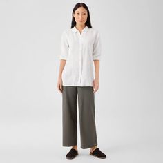 The essential wide-leg pant in a signature fabric we count on. With an elastic waist and an ankle-baring length, in our washable stretch crepe. Effortless Wide Leg Pants For Work, Casual Wide Leg Pants With Straight Hem For Daywear, Wide Leg Pants With Straight Hem For Daywear, Classic Ankle-length Wide Leg Pants For Daywear, Spring Wide Leg Pants With Straight Hem, Classic Relaxed Fit Wide Leg Pants For Daywear, A Signature, Stretch Crepe, Eileen Fisher