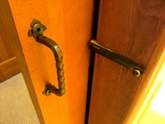 an open door with a handle on it and the words how to install surface bolt on door