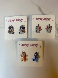 Bluey, Bingo, Unicorse, and Muffin Earrings.  These earrings, available is stud piercing or clip on, are made from shrinky dinks and epoxy resin. Show love for everyone's favorite show with a set of Bluey and Bingo, set of Bingo, set of Bluey, set of Unicorse, or set of Muffin. Note: if you get all three sets it will include the Bluey and Bingo combo, Unicorse, and Muffin. Blue Quirky Earrings As Gift, Quirky Blue Earrings For Gift, Quirky Blue Jewelry For Gifts, Quirky Blue Jewelry For Gift, Themed Blue Earrings For Gifts, Blue Kawaii Earrings For Gift, Themed Blue Earrings For Gift, Blue Themed Earrings For Gift, Cute Blue Jewelry For Birthday Gift