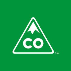 a green triangle with the word co on it and an arrow in the center that says co