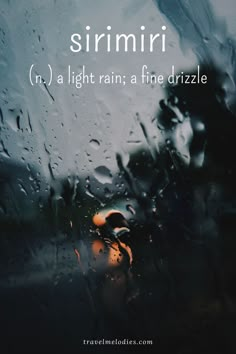 rain is pouring down on the window and it says, sriri n'a light rain