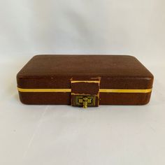 "A rustic vintage brown leather mens jewelry box with velvet inside. Great for traveling or make a statement while displaying on your dresser or bathroom counter. This piece has definite ware but still a very cool vintage piece. Measures - 7\" long X 4-1/4\" wide X 1-1/2\" deep. READY TO SHIP. Thank you for visiting The Freckled Berry! Be sure to check out other great items on my site. Vintage Treasures: http://www.etsy.com/shop/TheFreckledBerry?section_id=12639845 Games, Toys, Dolls: http://www Brown Rectangular Jewelry Storage As Gift, Classic Brown Rectangular Jewelry, Vintage Brown Rectangular Jewelry, Vintage Brown Jewelry For Gift, Brown Leather Jewelry, Army Men Toys, Mens Jewelry Box, Blue Glassware, Leather Jewelry Box