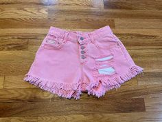 These are so cute! Completely hand distressed one of a kind shorts. They used to be mine and I loved them! This is amazing. Would be a perfect throwback item in any collection/wardrobe. Also would be a great gift. Don't miss out on this one. Condition is exactly as pictured. Size 3. Please make sure you know what you're ordering because there are no returns or cancellations. Thank you!! Fitted Pink Jean Shorts, Trendy Pink Mid-rise Jean Shorts, Daisy Duke, Pink Shorts With Built-in Shorts, Fun Pink Shorts With Built-in Shorts, Pink High-waisted Cotton Jean Shorts, Daisy Duke Shorts, Daisy Dukes, Pink Daisy