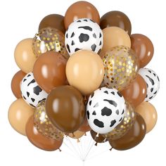 a bunch of balloons that are in the shape of cow's head with gold and white confetti on them