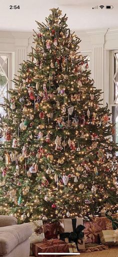 a decorated christmas tree in a living room