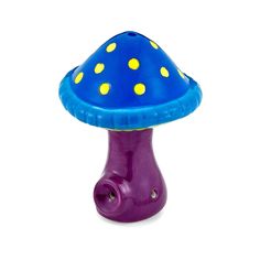 a purple and blue mushroom shaped object with yellow dots on it's top, against a white background