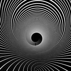 an abstract black and white photo with spiral lines in the center, looking like a tunnel