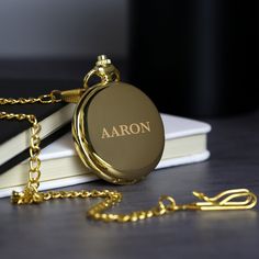 Our Personalised Name Gold Pocket Fob Watch is a truly unique keepsake to bring a smile to any man's face on their special occasion. He will absolutely love his new chrome plated fob watch, engraved with his own name, to make this gift extra special and unique. This pocket watch is a great idea for birthdays, anniversaries or weddings, where the father of the bride or groom can add this little accessory to their tux to check the time on the special day. Chain length is 35cm. Batteries included. Chrome plated Height: 4.5 CM Width: 4.5 CM Depth: 0.7 CM Ideal for Fathers Day, Birthday, Weddings, Anniversaries, and more. Engraved Watches For Men Birthday, Wedding Tokens, Wedding Favours Thank You, Thank You Presents, Fob Watch, Birthday For Him, Presents For Men, Perfect Wedding Gift, Pocket Watches