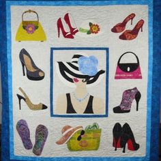 a quilted wall hanging with shoes and purses on it