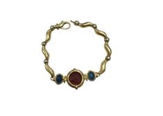 GIROVI Very Impressive Cameo Carnelian Inlay and Sapphire 18K Solid Yellow Gold Designer Bracelet  Suggested Replacement Value: $9,800.00 STAMPED: 750 (18K) Two Natural Cabochon Sapphires: 8.76 x 6.40mm Natural Red Cameo Carnelian Size: 17mm Bracelet length is: 7.5 inches Bracelet Width: 19.33mm ( widest part) Bracelet total weight: 18.3g Disclaimer: all weights, measurements and colors are approximate and may vary slightly from the listed dimensions or as seen in the image. All pictures are mag Luxury Carnelian Jewelry For Formal Occasions, Formal Gold Carnelian Jewelry, Formal Gold Bracelets With Natural Stones, Formal Yellow Gold Bracelets With Natural Stones, Luxury Gold Carnelian Jewelry, Gold Designer Bracelet, Elegant Round Carnelian Bracelets, Gold Carnelian Bracelet, Formal Cameo Carnelian Jewelry