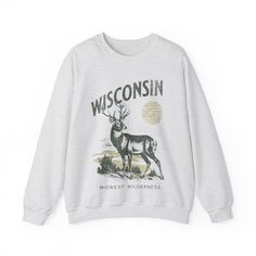 Step into the wild heart of the Midwest with our Wisconsin "Midwest Wilderness" Vintage Sweater. Featuring a vintage deer design, it exudes nostalgia and rugged charm. Crafted for comfort and durability, this Wisconsin crewneck is perfect for adventurers and nature lovers alike. Embrace the untamed spirit of Wisconsin's wilderness in style. Crafted on demand for you, our product may take a bit longer to reach you, but it actively minimizes overproduction. Thank you for making sustainable choices in shopping! Fall Outdoor Crew Neck Sweatshirt, Fall Crew Neck Sweatshirt For Outdoor, Outdoor Cotton Sweater With Letter Print, Fall Hiking Sweatshirt With Letter Print, Fall Hiking Crew Neck Sweatshirt, Fall Hiking Sweatshirt Crew Neck, Fall Crew Neck Sweatshirt For Hiking, Casual Hiking Sweatshirt With Letter Print, Casual Outdoor Sweater With Letter Print