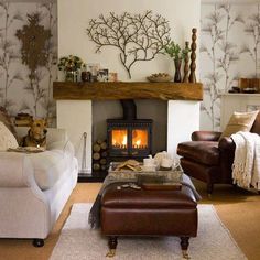 a living room filled with furniture and a fire place