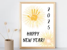 a happy new year card with fireworks in the background and a potted plant next to it