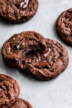 chocolate cookies with melted chocolate on top