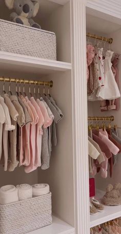 a closet filled with lots of baby clothes