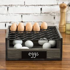 an egg tray with eggs in it on a table