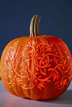 a carved pumpkin sitting on top of a table