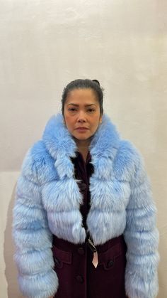 Soft, fluffy and luxurious this long sleeve faux fur jacket is cozy with a hood and has a voluminous cropped silhouette. Fully lined in black and silver-tone zip-up closure at front. Hooded Faux Fur Coat With Fluffy Detail, Hooded Fluffy Faux Fur Coat, Fluffy Hooded Faux Fur Coat, Fluffy Hooded Faux Fur Outerwear, Blue Fluffy Winter Outerwear, Fluffy Blue Outerwear For Winter, Faux Fur Hooded Coat, Roper Boots, Pink Faux Fur