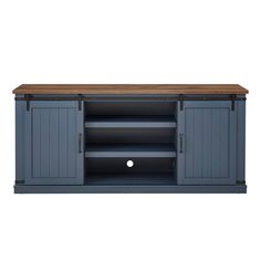 an entertainment center with wooden top and metal legs, in dark blue painted wood paneling