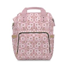 a pink and white backpack with flowers on the front, zippered closures and side pockets