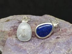 ARTSMYRNA METAL: 925k Silver GEM: Natural Lapis COATING: 24k gold over (We can made a special type of coating for your personal preference ) MATERIEL : 925K Sterling Silver ( Some of my items vermeil gold over silver for looks rich . But i can finish in silver too ) Benefit: Strengthens physical abilities and communication ability. Properties: Lapis lazuli stone has been used as an ornament and jewelry since Ancient Egypt and Pharaohs. The stone usually has nocturnal blue tones. Its color is onl Sterling Silver Cabochon Drop Jewelry, Sterling Silver Teardrop Cabochon Earrings, Silver Cabochon Teardrop Earrings, Silver Teardrop Cabochon Earrings, How To Look Rich, Lapis Lazuli Stone, Blue Tones, Ancient Egypt, Gemstone Earrings