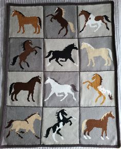 a crocheted afghan with horses on it's sides and four different colors