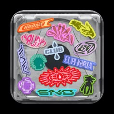 various colored stickers in a clear plastic container on a black background, with the words club