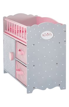 a pink and grey wooden toy chest with polka dots on the bottom, two drawers