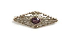 Welcome To Gold Knox Original beautiful vintage 10K yellow solid gold brooch/pin with faceted purple amethyst stone Real beauty!! Details below: Weight: 2.6 gm Length: 36.8 mm long Width : 14.6 mm wide Material: 10K Yellow Gold, Purple Amethyst Hallmarked: 10K Gold Knox opened its storefront in Pasadena, CA in 2011, since then we have an online store on eBay, and we joined Etsy in 2016 where we offer our unique and desirable items for you. Most all our items are vintage they are previously used, Antique Hallmarked Purple Brooches, Antique Purple Hallmarked Brooches, Purple Amethyst Brooches For Wedding, Elegant Purple Brooches For Anniversary, Antique Purple Brooches For Formal Occasions, Purple Gemstone Brooches For Weddings, Purple Gemstone Wedding Brooches, Purple Gemstone Brooches For Gift, Antique Purple Formal Brooches