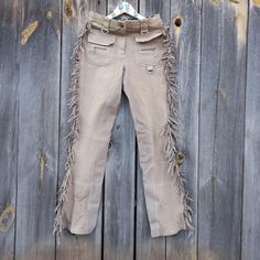 00s beige leather Pants women Crazy Rider Fringe Cowboy Y2K Vintage men XS S Trousers Clothing Boho style Rustic Clothes Hippie Western  Pants for equestrian sports, with leather inserts and fringe. They stretch well     Size XS or S  Waist 28 inches (71 cm) Hips 36 inches (91cm) Length on the side seam 41 inches (104cm) Length in inner seam 32.5 inches (81 cm) Beige Leather Pants, Rustic Clothes, Cowboy Y2k, Western Pants, Trouser Outfits, Leather Pants Women, Equestrian Sports, Boho Stil, Pants Women