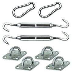 an assortment of hooks and shacks on a white background