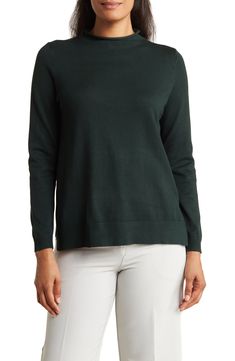 A mock neckline tops a long-sleeve sweater featured in a solid hue for easy, everyday pairing. Mock neck Long sleeves 75% viscose, 25% polyester Machine wash, line dry Imported Model stats: 5'10" height, 32" bust, 25" waist, 36" hip. Model is wearing size Small. Casual High Neck Long Sleeve Top For Layering, Solid Mock Neck Top For Layering, Classic Turtleneck Knit Top For Fall, Fall Mock Neck Long Sleeve Top In Fine Knit, Fall Mock Neck Long Sleeve Fine Knit Top, Versatile Solid Mock Neck Top For Fall, Fall Mock Neck Top For Layering, Fall Mock Neck Top With Ribbed Neckline For Work, Fall Layering Mock Neck Knit Top