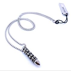 William Rast Men’s Tough Guy Biker Bullet Skull Necklace 13” Double Side 26” Total Chain Length Brand New With Tag A Haunting Pile Of Skulls Is Etched Onto The Surface Of A Bullet. Unique And Dramatic! Hangs Forebodingly From A Long Chain. This Necklace Bullet Pendant With Skulls Look Dope As Fuck, & Gives You Tough Guy Look. Pile Of Skulls, Skull Bracelet, Tough Guy, Skull Necklace, Beaded Skull, Mens Accessories Jewelry, Strand Bracelet, Long Chain, Stainless Steel Chain