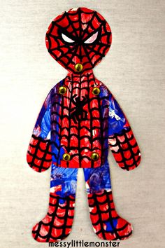 a paper doll made to look like spider man