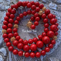 DESCRIPTION: Thank you for coming in! Beautiful rare Mediterranean Sardinia Coral with OX blood red color and sphere shape! The color is directly from the ocean, not dyed! 100% natural beauty! 28 inch necklace with 18k solid gold diamond spacers and clasp! Manufactured in Italy! 327 carats! You'll get the necklace you see! SIZE of the coral : Appr.7.5mm-11.5mm COLOR: OX Blood Red GRADE: AA Luxury Red Coral Necklaces, Red Ruby Round Beaded Necklace, Luxury Red Coral Necklace, Red Ruby Beaded Necklace, Red Coral Jewelry With 8mm Beads, Luxury Red Necklace With Polished Beads, Red Polished Beads Necklace For Meditation, Elegant Red Beaded Bracelets For Meditation, Red Ruby Beads For Gifts