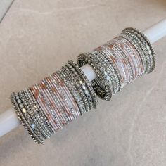 Pale pink and silver sparkly bangle set with touch of rose gold glitter.  Ready to Ship! Sold as a set for both arms only. Bridal Survival Kit, Bangle Box, Hand Harness, Bridal Choker, Bridal Necklace Set, The Bangles, Bridal Bangles, Pink And Silver, Classy Jewelry