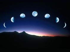 five phases of the moon over mountains at night