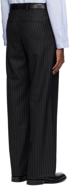 Loose-fit straight-leg stretch polyester- and wool-blend gabardine trousers. Pinstripes throughout. · High-rise · Belt loops · Four-pocket styling · Zip-fly Supplier color: Black Tailored Pinstripe Tapered Leg Pants, Tailored Pinstripe Straight Leg Dress Pants, Tailored Pinstripe Dress Pants With Tapered Leg, Pinstripe Dress Pants With Welt Pockets For Work, Tailored Tapered Leg Pants With Vertical Stripes, Pinstripe Tapered Leg Business Casual Pants, Pinstripe Tapered Leg Business Bottoms, Tailored Pants With Vertical Stripes And Tapered Leg, Tailored Pinstripe Straight Dress Pants