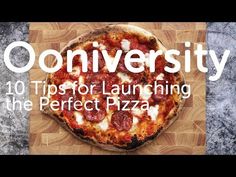 a pizza sitting on top of a cutting board with the words, university 10 tips for launching