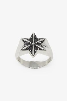 the Gothic Star Sterling Silver Ring is a timeless piece crafted from 100% sterling silver, featuring custom molds for a unique design featuring a large gothic star detail on a signet shape. The vintage patina adds a touch of classic charm and presented in a custom embossed box and velvet bag. details four sizes 925 Sterling Silver hand polished custom packaging Care Instructions: Each piece is waterproof and sweatproof. To clean any blemishes or tarnish after long wear, wipe down with a clean c Classic Silver Star Shaped Rings, Silver Star Ring, Bag Details, The Gothic, Star Ring, Velvet Bag, Custom Packaging, The Vintage, Cleaning Clothes