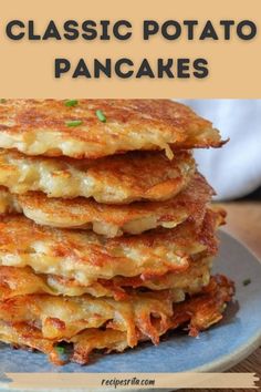 a stack of pancakes on a plate with the words classic potato pancakes in front of it