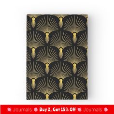 a black and gold wallpaper with an art deco fan pattern on the front, next to a red ribbon that says journal journals 2 get 15 % off